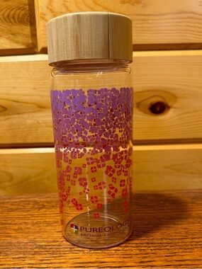 Pureology Glass Water Bottle with Bamboo Lid in Purple and Pink Floral ombré